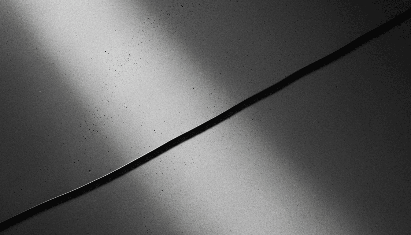 Network cable casting a sharp shadow on polished concrete floor